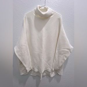 Women’s oversized sweater ; size M